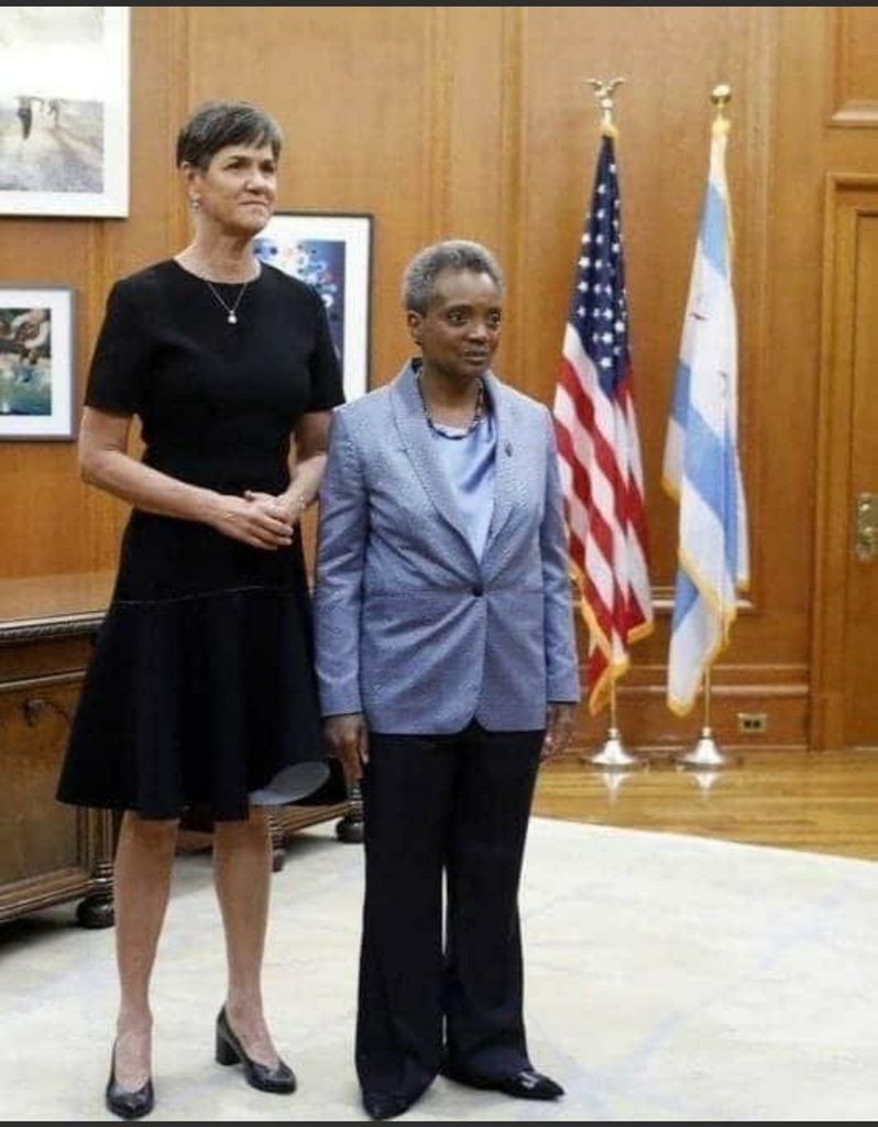 This is Mayor of Chicago, Lori Lightfoot, and her wife, the First Lady of C...