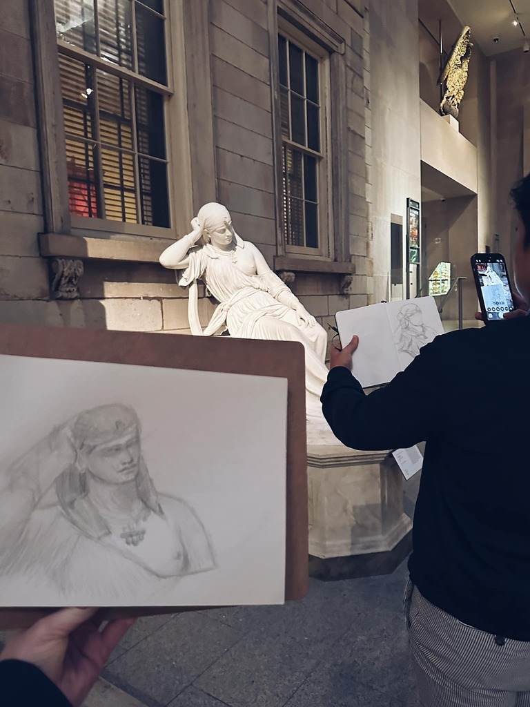 AI caption: a drawing of a woman with a headdress, portrait a man is taking a picture of a statue
