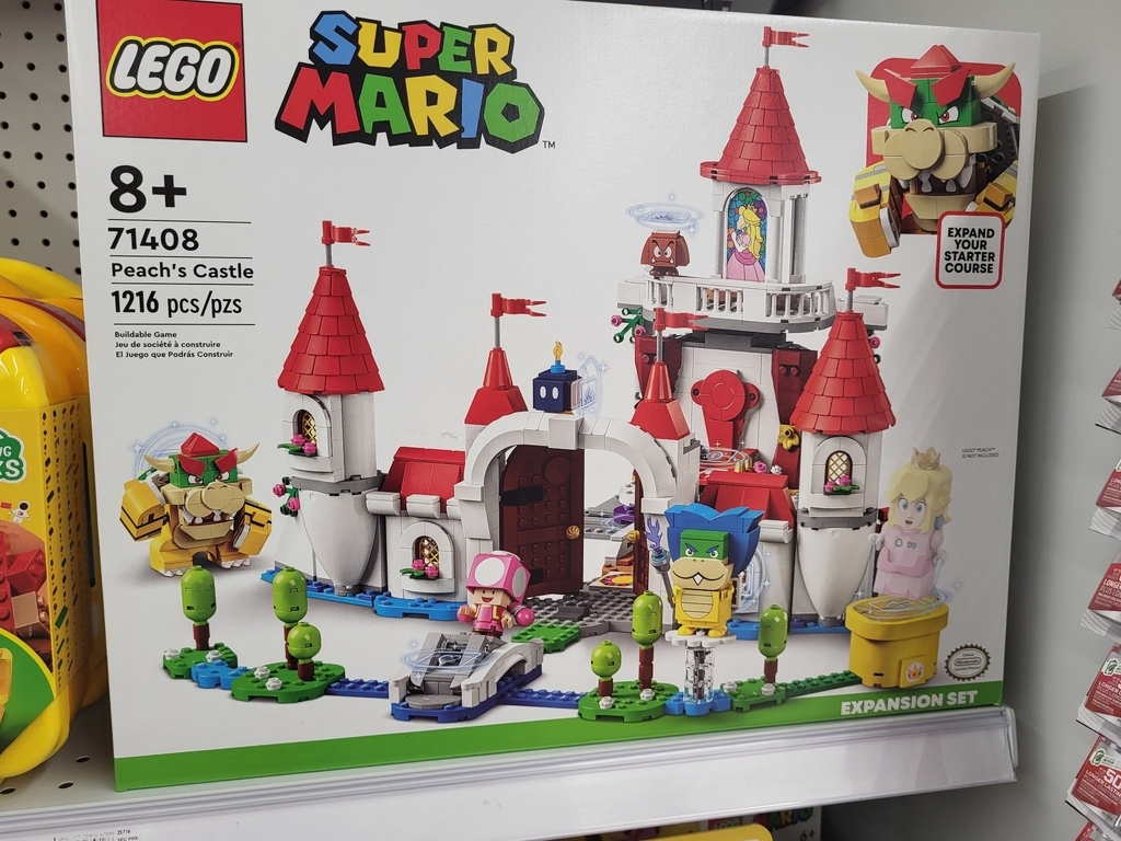 AI caption: lego super mario castle set, b).