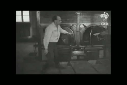 AI caption: a man is standing in front of a machine, black and white