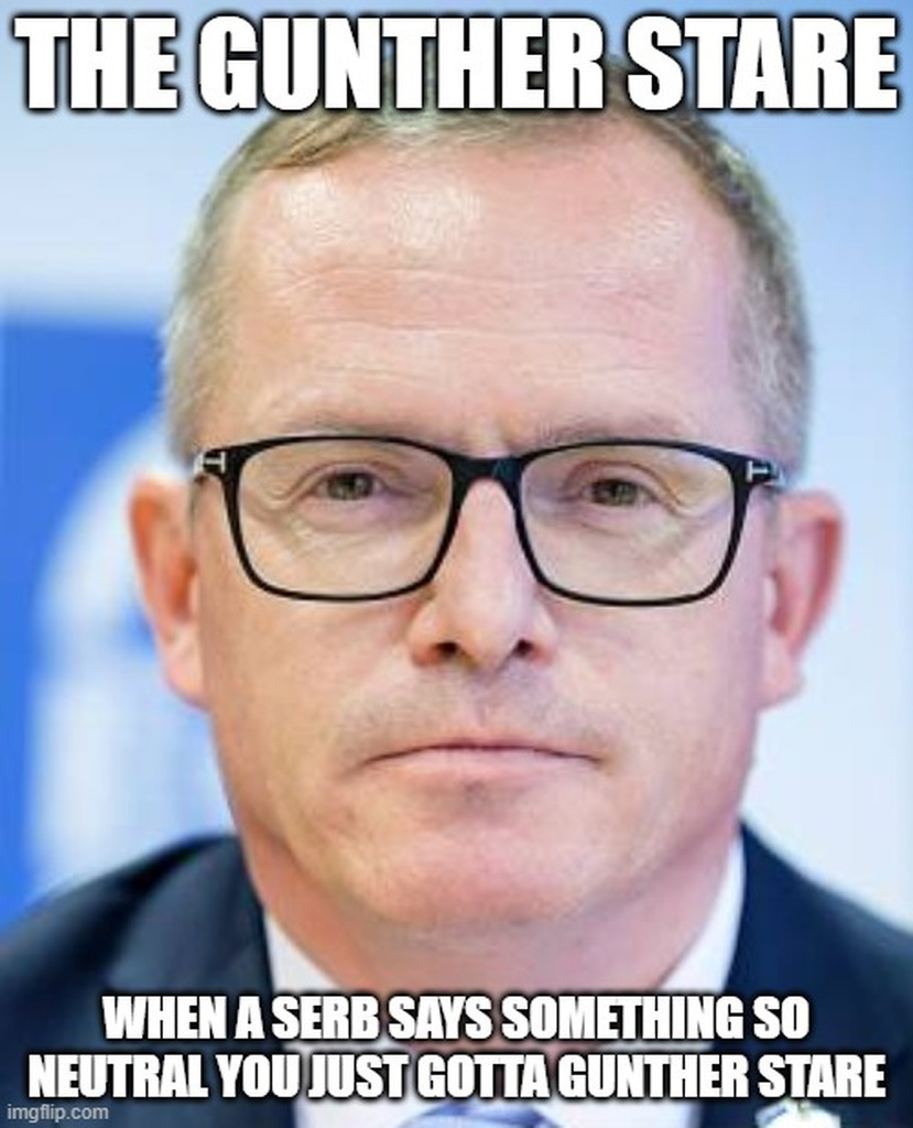 AI caption: a man in glasses with the words, the gunther state when a ser says something so neutral you gotta gunther state, portrait