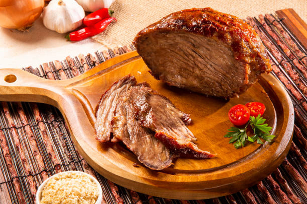 AI caption: a piece of beef on a wooden cutting board, black and white