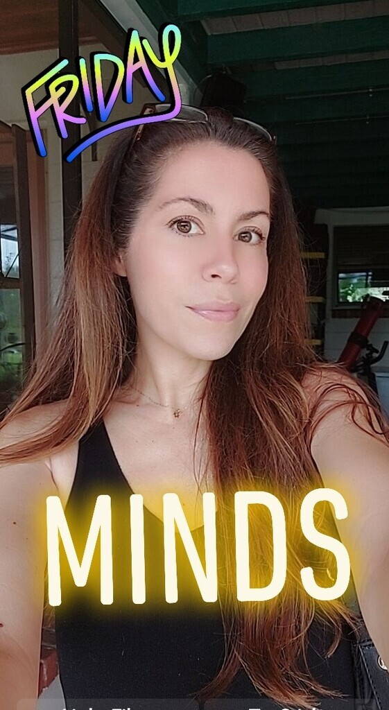 AI caption: friday minds - a woman taking a selfie, black and white