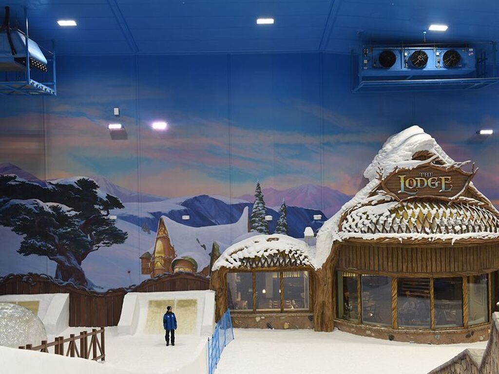 AI caption: a snowy indoor playground with a snowman and a snowman, cartoon