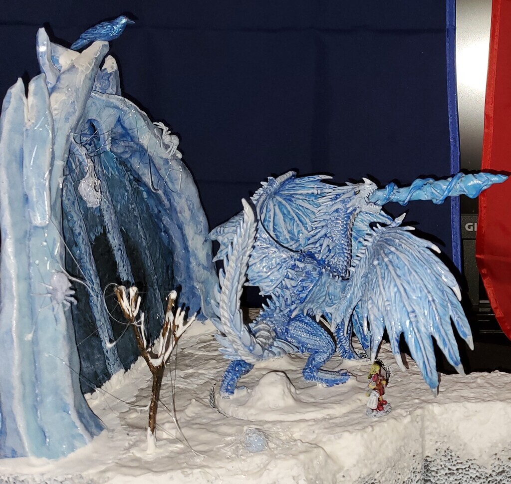 AI caption: a blue dragon is standing in front of a snowy scene, cartoon