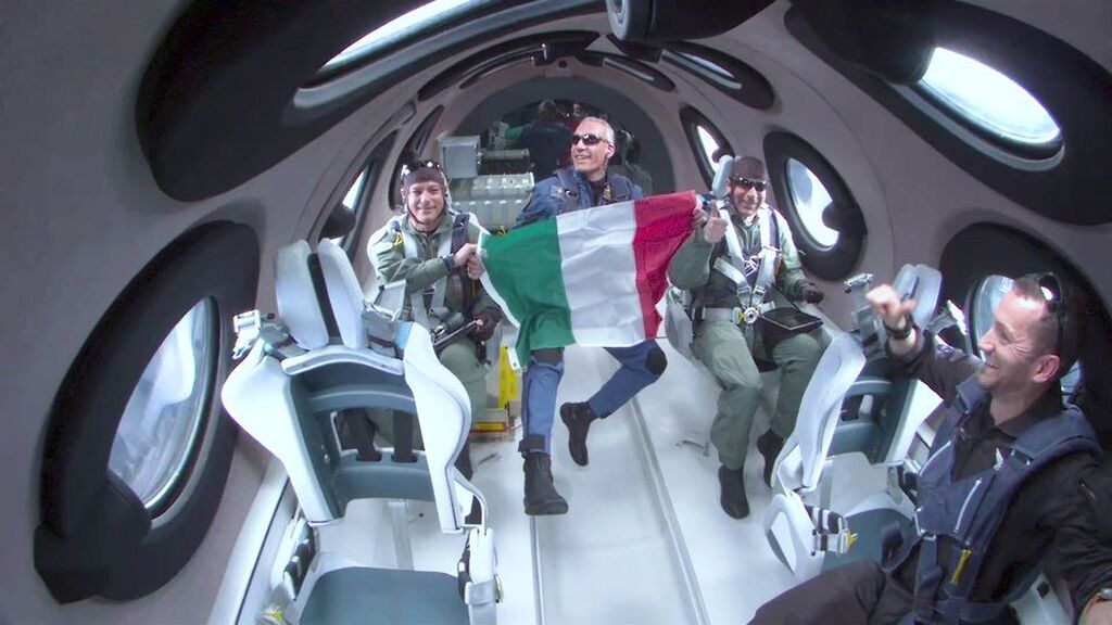 AI caption: a group of men in a spaceship with an italian flag, black and white