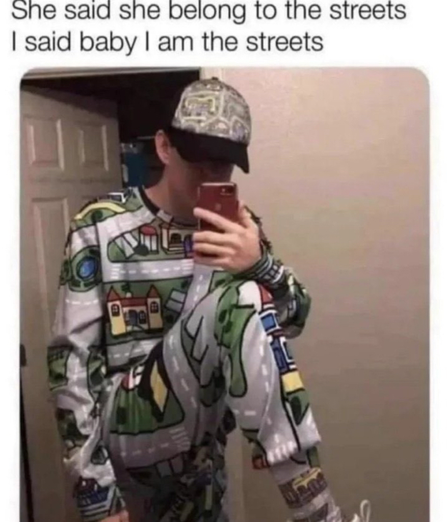 AI caption: a man in a pajama shirt with a text saying she belongs to the streets, text