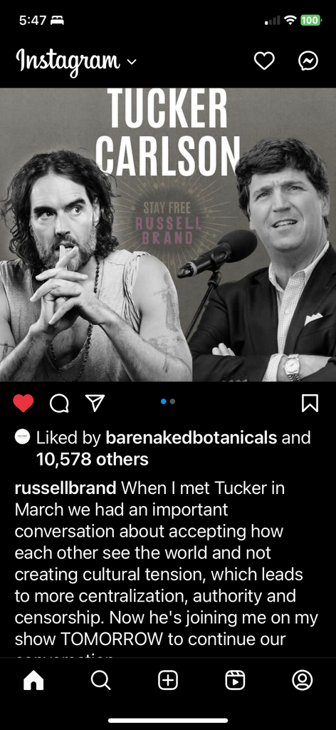 AI caption: the image is a picture of a man in a suit