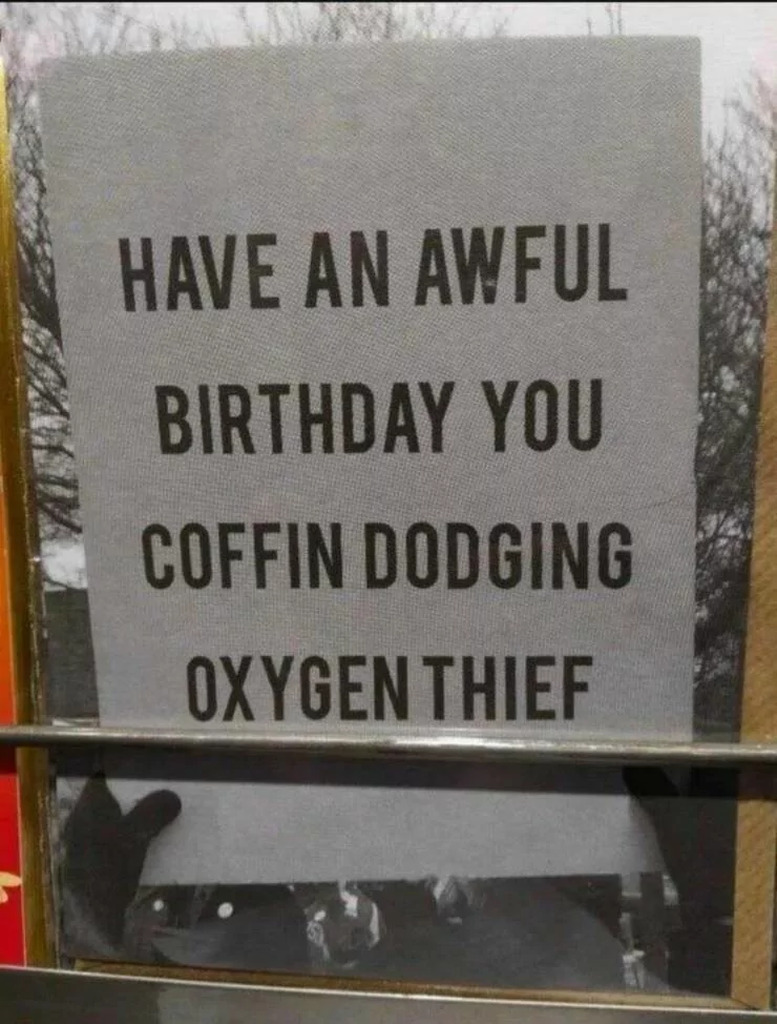 AI caption: a sign that says have an awful birthday you coffin doodling oxygen thief, vintage