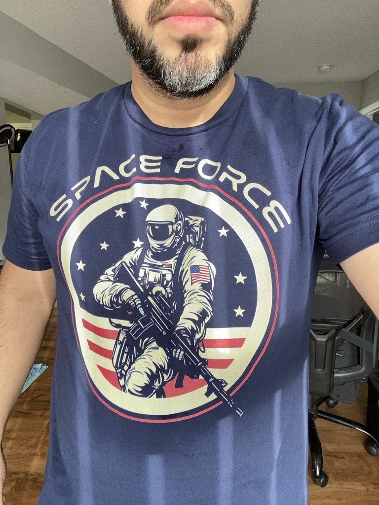 AI caption: a man wearing a space force t - shirt, portrait