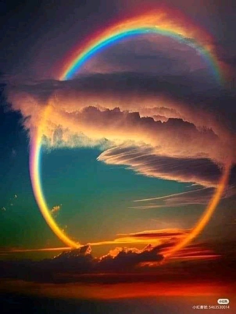 AI caption: a rainbow is seen in the sky at sunset, abstract
