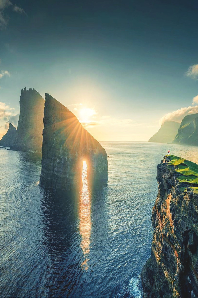 AI caption: a rocky cliff with the sun shining on it, abstract