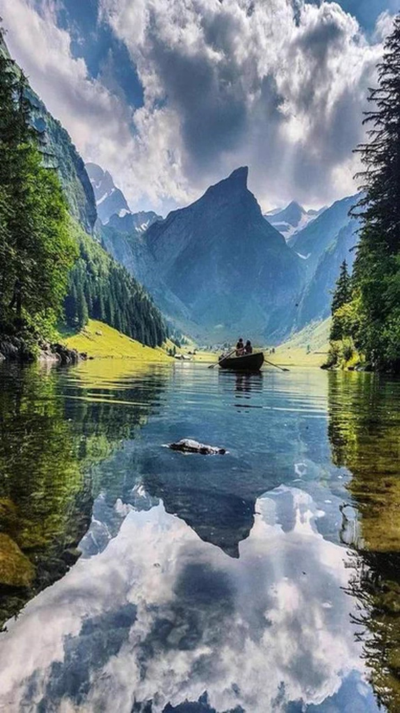 AI caption: a boat is reflected in a lake near mountains, abstract