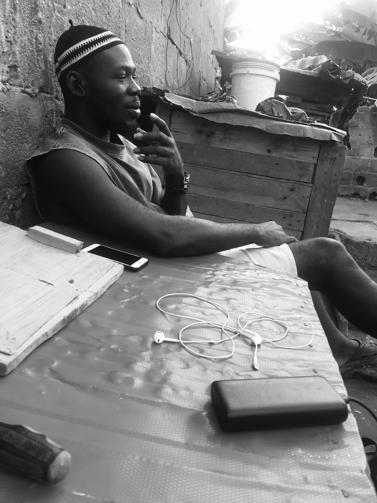 AI caption: a man sitting on a blue blanket, black and white a man sitting on a table with a cell phone, the man is sitting on the ground, black and white a man sitting on a table with a cell phone, the man is sitting on the ground with his phone, black and white a man sitting on a blue blanket, the man is sitting on the ground, black and white a man sitting on a table with a cell phone, the man is sitting on the ground with his phone, black and white a man sitting on a blue blanket, the man is sitting on the ground, black and white a man sitting on a table with a cell phone, the man is sitting on the ground with his phone, black and white a man sitting on a blue blanket, the man is sitting on the ground, black and white a man sitting on a table with a cell phone, the man is sitting on the ground with his phone, black and white a man sitting on a blue blanket, the man is sitting on the ground, black and white a man sitting on a table with a cell phone, the man is sitting on the ground with his phone, black and white a man sitting on a blue blanket, the man is sitting on the ground, black and white a man sitting on a table with a cell phone, the man is sitting on the ground with his phone, black and white a man sitting on a blue blanket, the man is sitting on the ground, black and white a man sitting on a table with a cell phone, the man is sitting on the ground with his phone, black and white a man sitting on a blue blanket, the man is sitting on the ground, black and white a man sitting on a table with a cell phone, the man is sitting on the ground with his phone, black and white a man sitting on a blue blanket, the man is sitting on the ground, black and white a man sitting on a table with a cell phone, the man is sitting on the ground with his phone, black and white a man sitting on a blue blanket, the man is sitting on the ground, black and white a man sitting on a table with a cell phone, the man is sitting on the ground with his phone, black and white a man sitting on a blue blanket, the man is sitting on the ground, black and white a man sitting on a table with a cell phone, the man is sitting on the ground with his phone, black and white a man sitting on a blue blanket, the man is sitting on the ground, black and white a man sitting on a table with a cell phone, the man is sitting on the ground with his phone, black and white a man sitting on a blue blanket, the man is sitting on the ground, black and white a man sitting on a table with a cell phone, the man is sitting on the ground with his phone, black and white a man sitting on a blue blanket, the man is sitting on the ground, black and white a man sitting on a table with a cell phone, the man is sitting on the ground with his phone, black and white a man sitting on a blue blanket, the man is sitting on the ground, black and white a man sitting on a table with a cell phone, the man is sitting on the ground with his phone, black and white a man sitting on a blue blanket, the man is sitting on the ground, black and white a man sitting on a table with a cell phone, the man is sitting on the ground with his phone, black and white a man sitting on a blue blanket, the man is sitting on the ground, black and white a man sitting on a table with a cell phone, the man is sitting on the ground with his phone, black and white a man sitting on a blue blanket, the man is sitting on the ground, black and white a man sitting on a table with a cell phone, the man is sitting on the ground with his phone, black and white a man sitting on a blue blanket, the man is sitting on the ground, black and white a man sitting on a table with a cell phone, the man is sitting on the ground with his phone, black and white a man sitting on a blue blanket, the man is sitting on the ground, black and white a man sitting on a table with a cell phone, the man is sitting on the ground with his phone, black and white a man sitting on a blue blanket, the man is sitting on the ground, black and white a man sitting on a table with a cell phone, the man is sitting on the ground with his phone, black and white a man sitting on a blue blanket, the man is sitting on the ground, black and white a man sitting on a table with a cell phone, the man is sitting on the ground with his phone, black and white a man sitting on a blue blanket, the man is sitting on the ground, black and white a man sitting on a table with a cell phone, the man is sitting on the ground with his phone, black and white a man sitting on a blue blanket, the man is sitting on the ground, black and white a man sitting on a table with a cell phone, the man is sitting on the ground with his phone, black and white a man sitting on a blue blanket, the man is sitting on the ground, black and white a man sitting on a table with a cell phone, the man is sitting on the ground with his phone, black and white a man sitting on a blue blanket, the man is sitting on the ground, black and white a man sitting on a table with a cell phone, the man is sitting on the ground with his phone, black and white a man sitting on a blue blanket, the man is sitting on the ground, black and white a man sitting on a table with a cell phone, the man is sitting on the ground with his phone, black and white a man sitting on a blue blanket, the man is sitting on the ground, black and white a man sitting on a table with a cell phone, the man is sitting on the ground with his phone, black and white a man sitting on a blue blanket, the man is sitting on the ground, black and white a man sitting on a table with a cell phone, the man is sitting on the ground with his phone, black and white